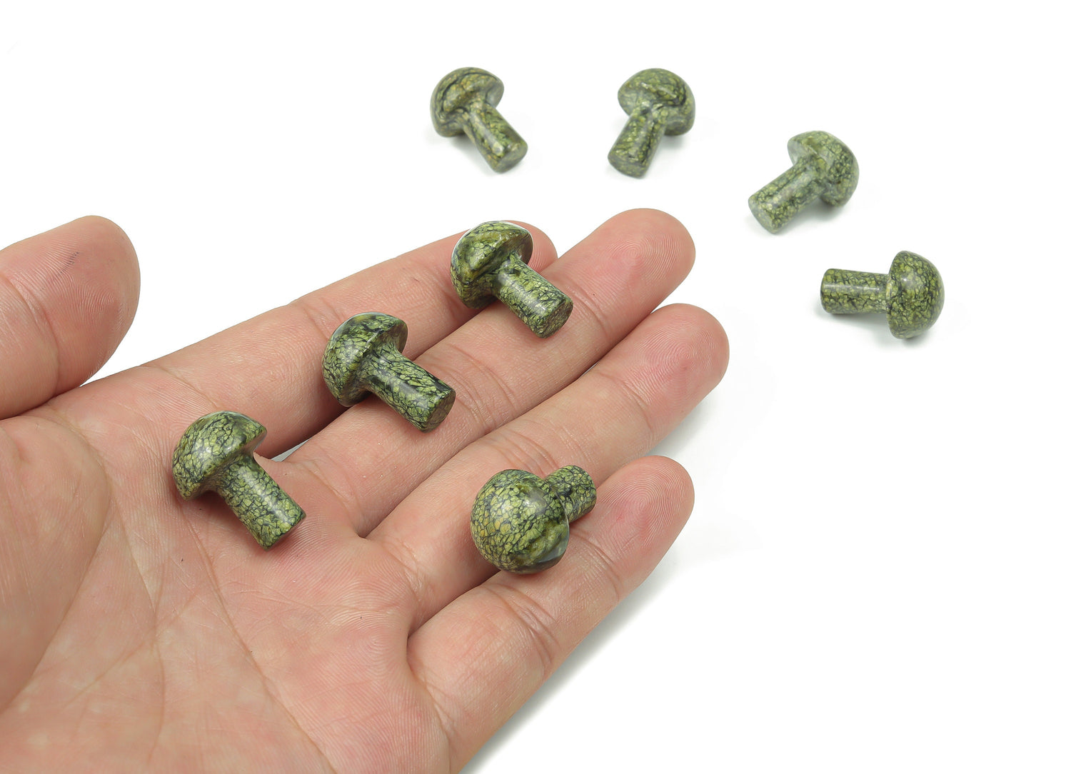 20mm Asterite Serpentine mushroom carved gemstone from GemstoneGO, showcasing a smooth, natural green stone with detailed mushroom shape.