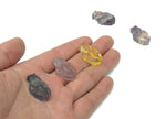 Colorful fluorite aquarium fish carving gemstone by GemstoneGO showing vibrant hues and detailed fish design.