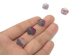 Mini fluorite flower carving gemstone by GemstoneGO, showing a colorful, detailed floral design on a small polished mineral piece.