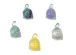 Mini fluorite turtle gemstone carving from GemstoneGO, showing vibrant purple and green hues on a smooth polished surface.