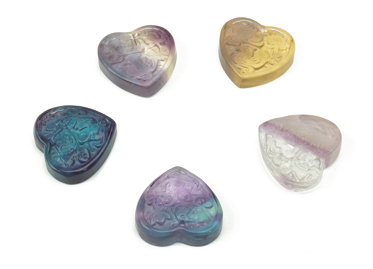 Fluorite heart-shaped gemstone carving by GemstoneGO, vibrant green and purple hues, detailed polished stone for jewelry or collection