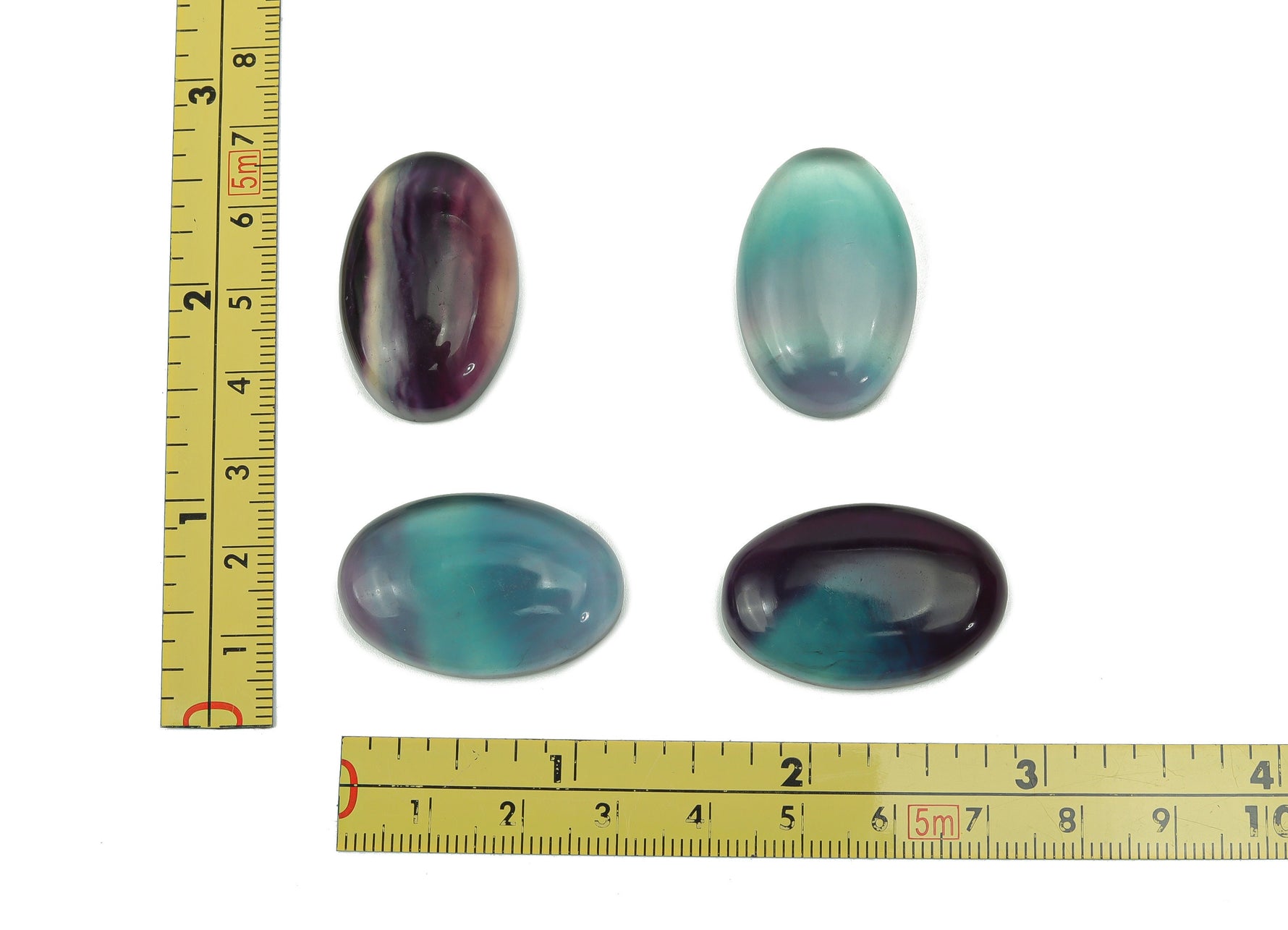 Fluorite flat gemstone slab by GemstoneGO showing vibrant green and purple hues with natural crystal patterns.