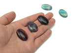 Flat fluorite gemstone slab with vibrant purple and green hues from GemstoneGO, showcasing its smooth, polished surface.