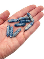Blue Spot Jasper carved terminated point gemstone, 33mm, from GemstoneGO, showcasing vibrant blue spots and intricate carving details.