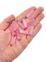 Pink Cats Eye carved point gemstone, 33mm, with a polished termination, from GemstoneGO, showcasing its vibrant pink color and smooth surface.