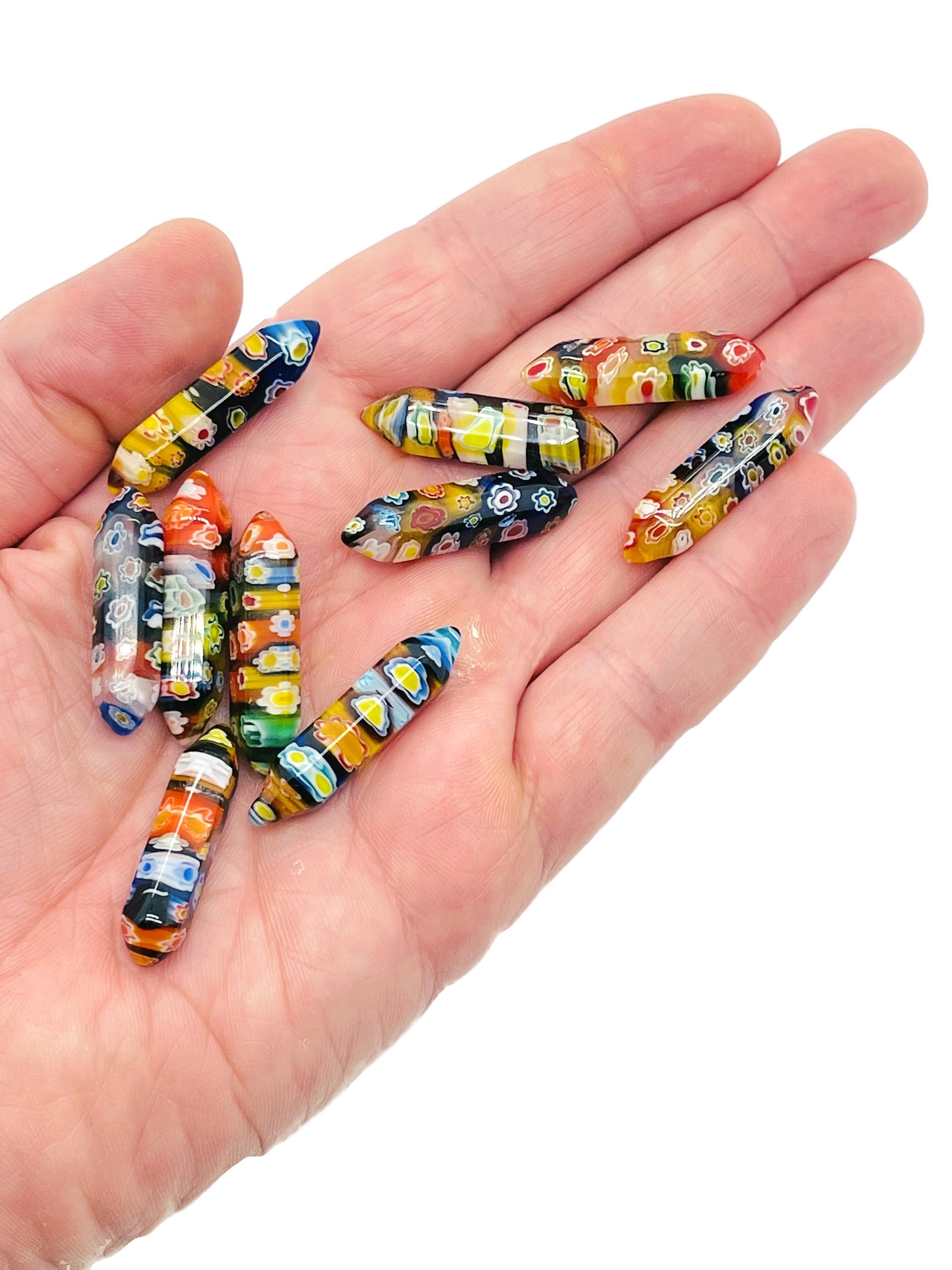 Murano glass terminated carved point gemstone, 3cm, with intricate detailing and vibrant colors, by GemstoneGO.