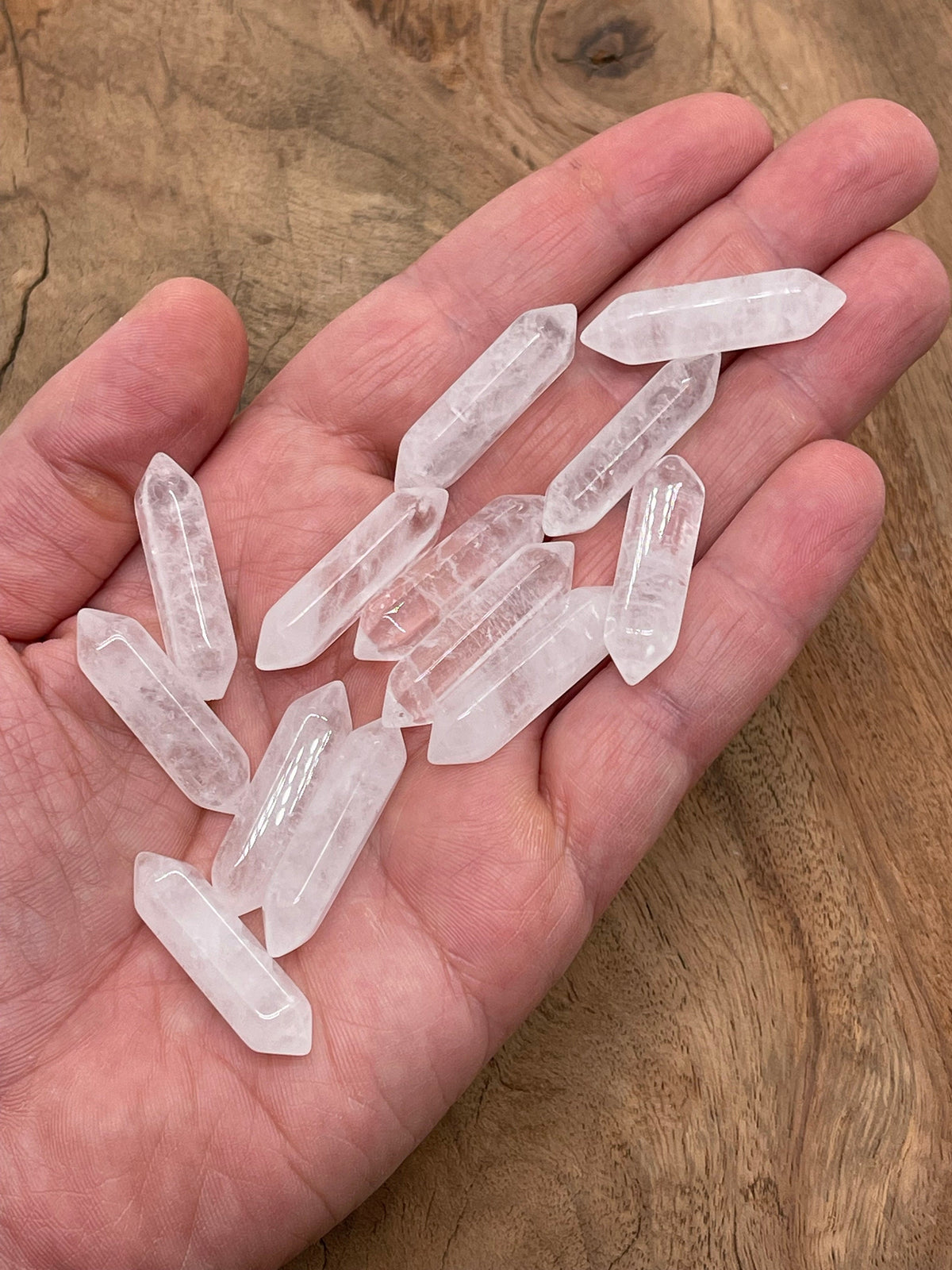 Clear Quartz terminated carved point gemstone, 33mm, from GemstoneGO, showcasing a polished, natural crystal with pointed tip.