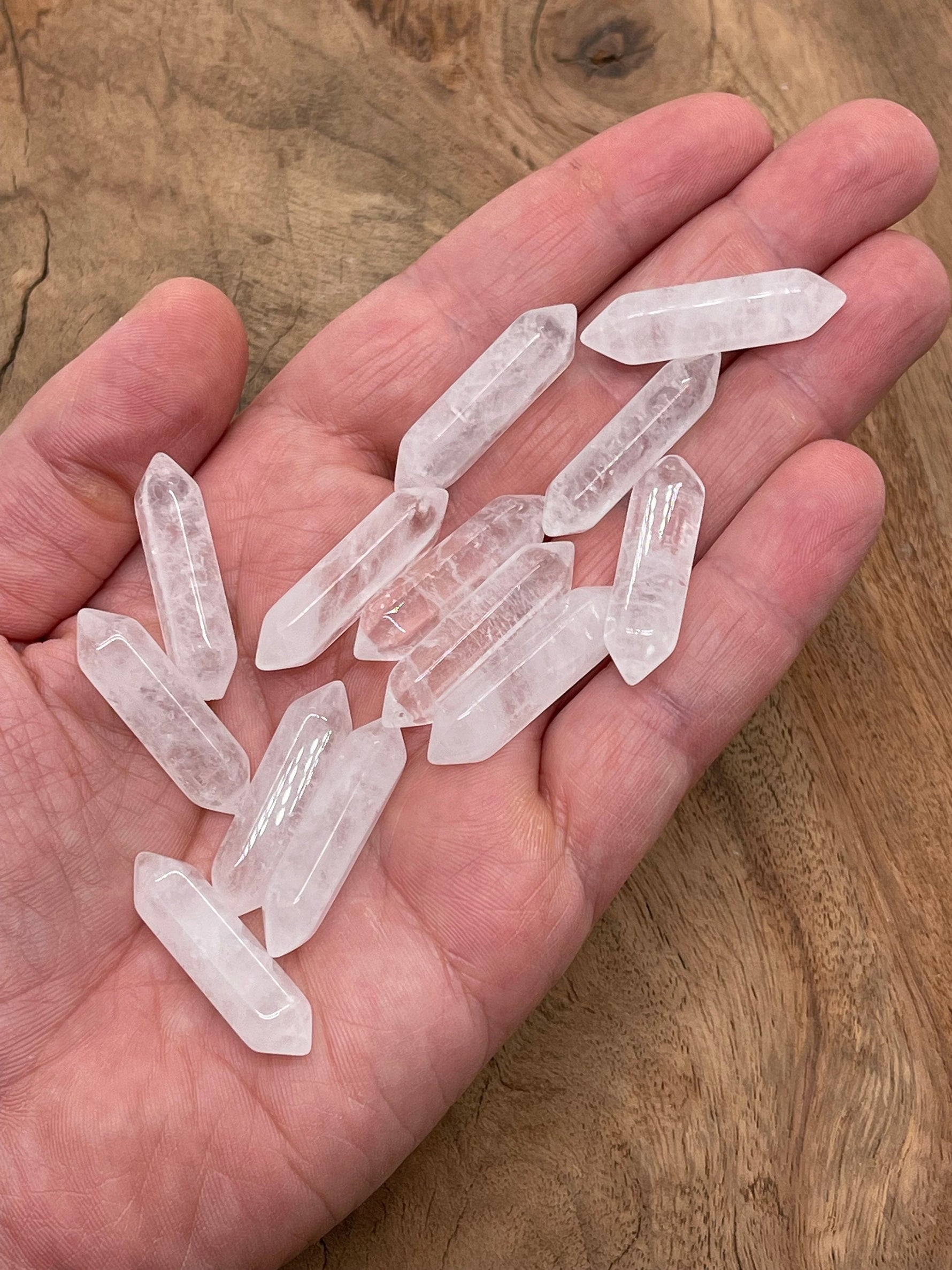 Clear Quartz terminated carved point gemstone, 33mm, from GemstoneGO, showcasing a polished, natural crystal with pointed tip.