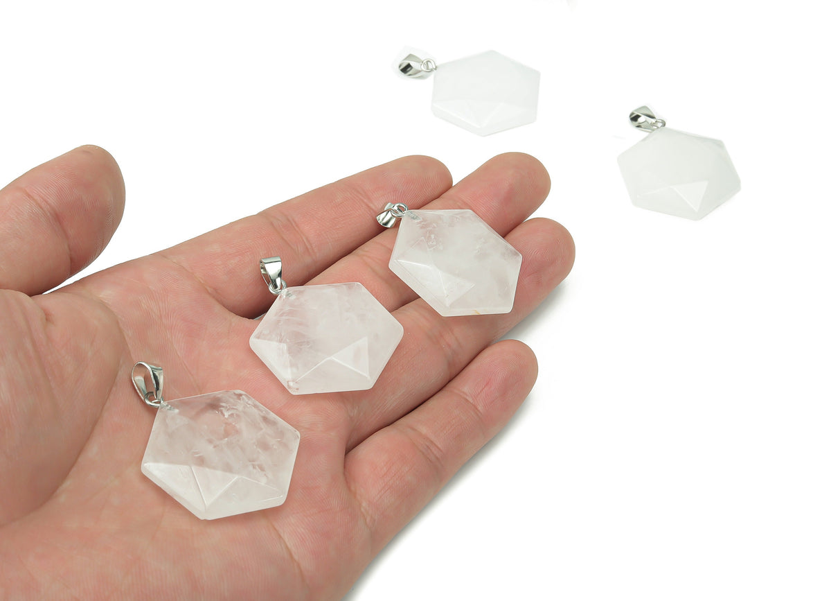 Clear quartz star Merkaba crystal pendant from GemstoneGO, showcasing a polished, star-shaped gemstone for jewelry making.