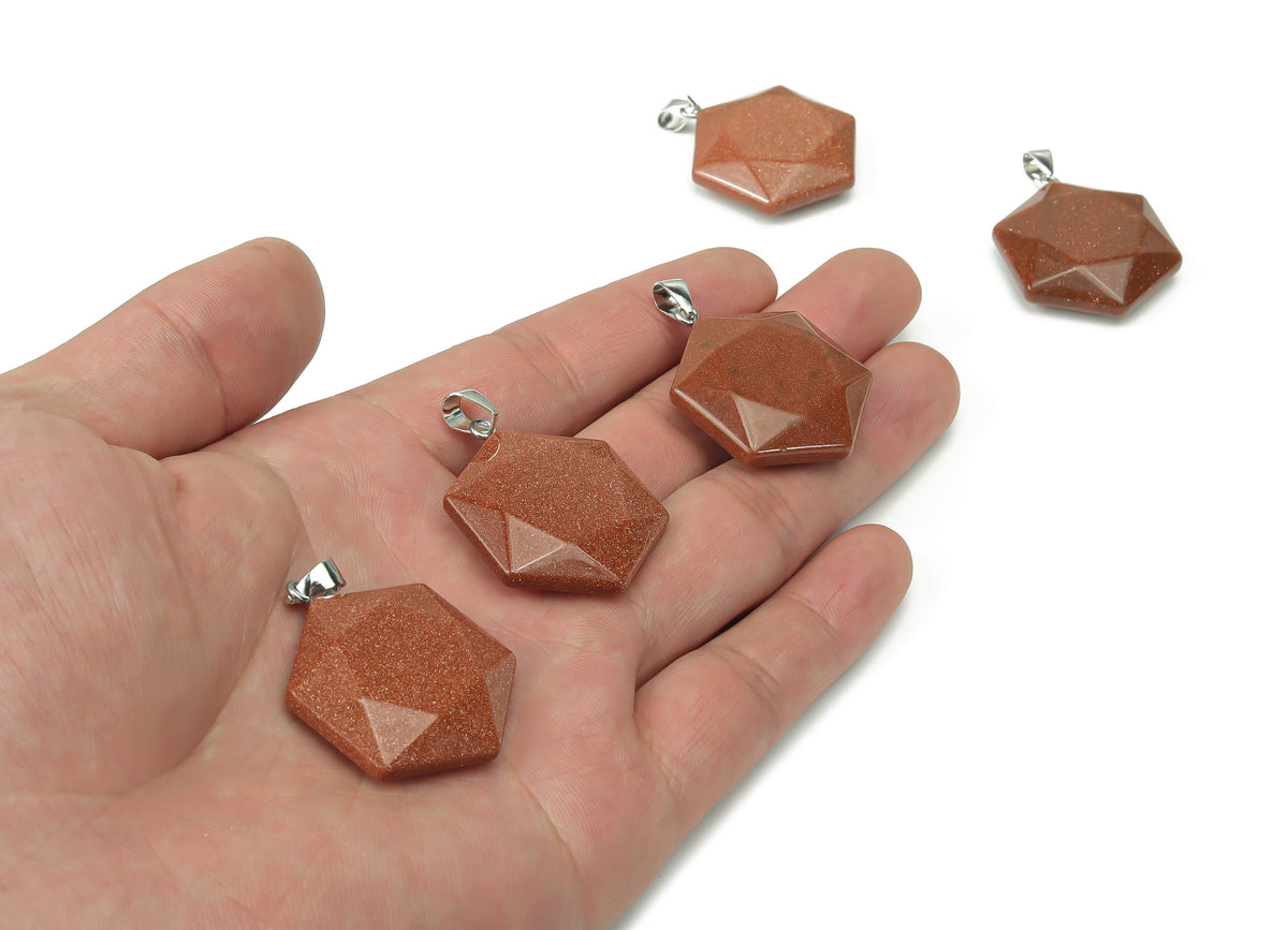 Goldstone Star Merkaba crystal pendant by GemstoneGO, featuring a shimmering goldstone star-shaped pendant for jewelry making.