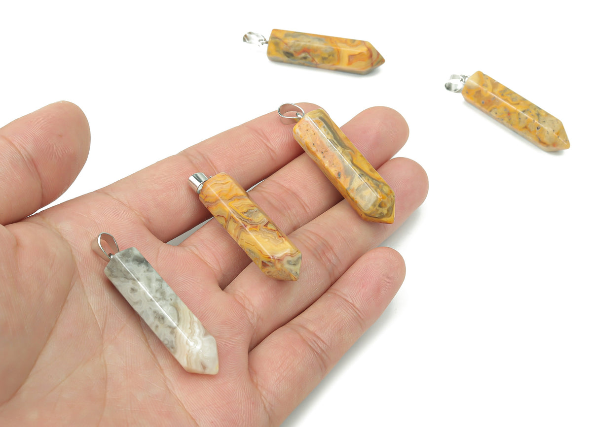 Crazy Lace Agate point crystal pendant from GemstoneGO, showcasing vibrant, detailed banding for jewelry making supplies.