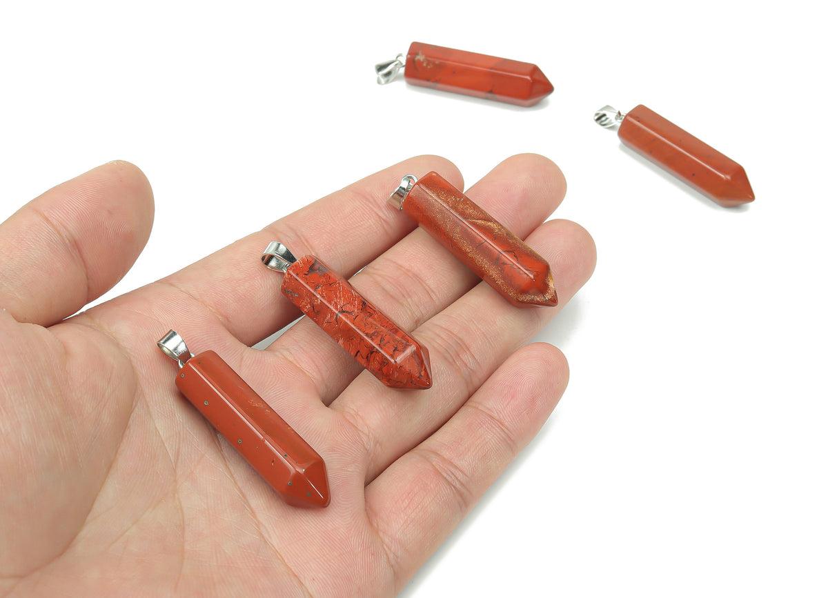 Red Jasper point crystal pendant from GemstoneGO, showcasing a polished red jasper stone with natural patterns and a pointed shape.