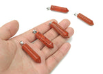 Red Jasper point crystal pendant from GemstoneGO, showcasing a polished red jasper stone with natural patterns and a pointed shape.