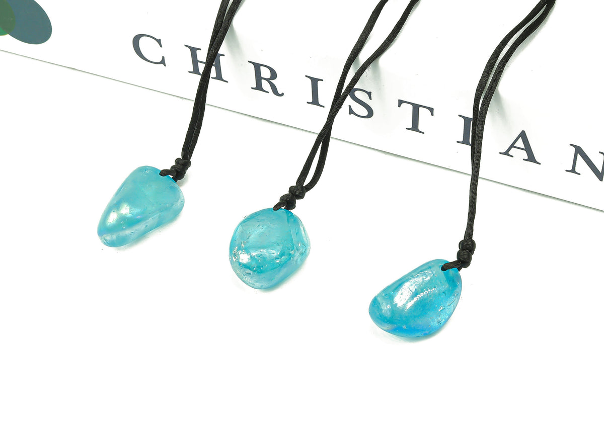 Blue Aura Quartz crystal pendant necklace on a cord, featuring a polished gemstone from GemstoneGO, perfect for gifts.