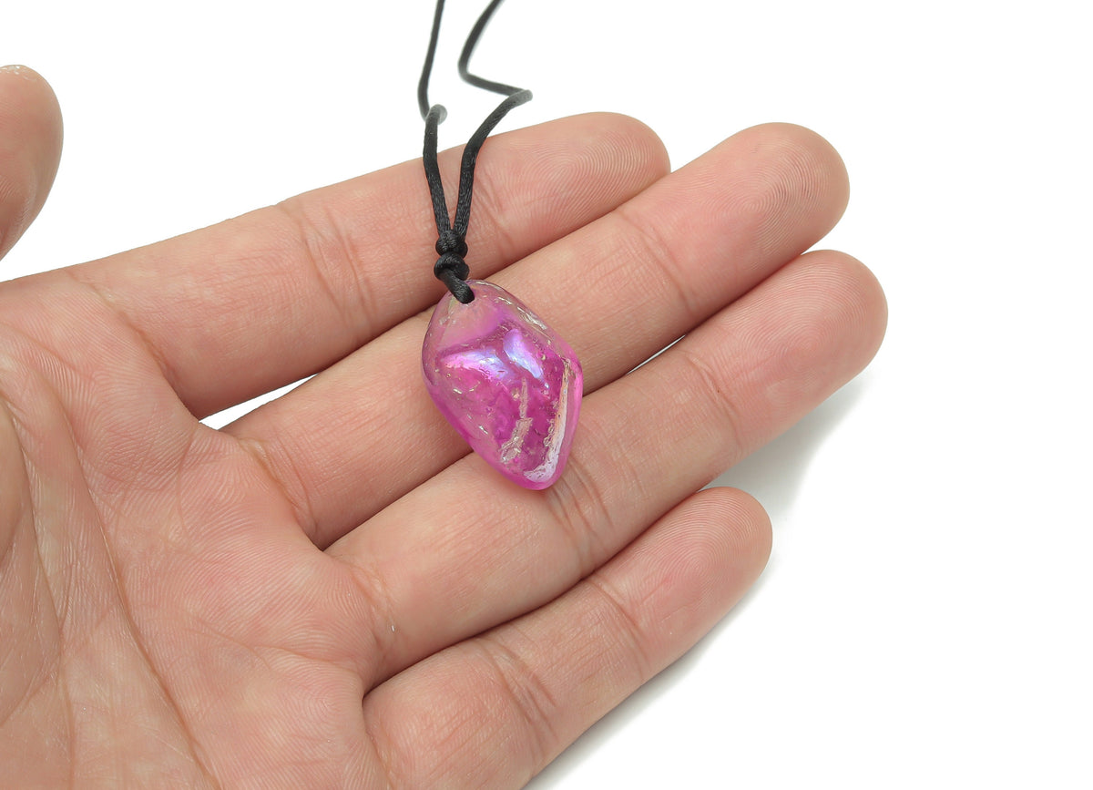 Purple aura quartz crystal necklace on a cord, featuring a polished purple gemstone pendant, ideal for jewelry and gift displays.