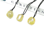 Yellow Aura Quartz crystal necklace on a cord, featuring a polished gemstone pendant from GemstoneGO.