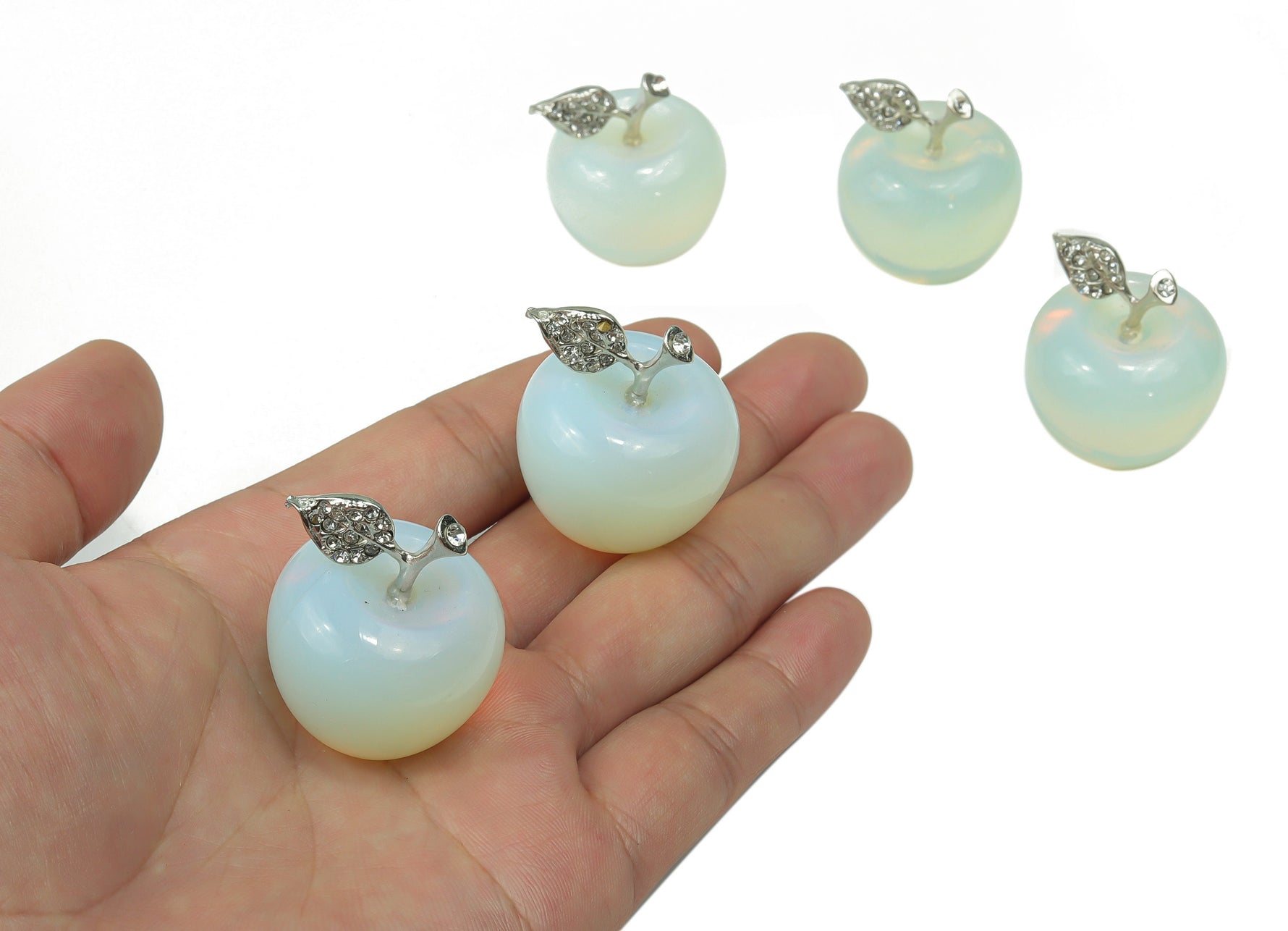 Opalite apple-shaped crystal carving from GemstoneGO, 30mm size, showcasing smooth, luminous gemstone with intricate carving details.