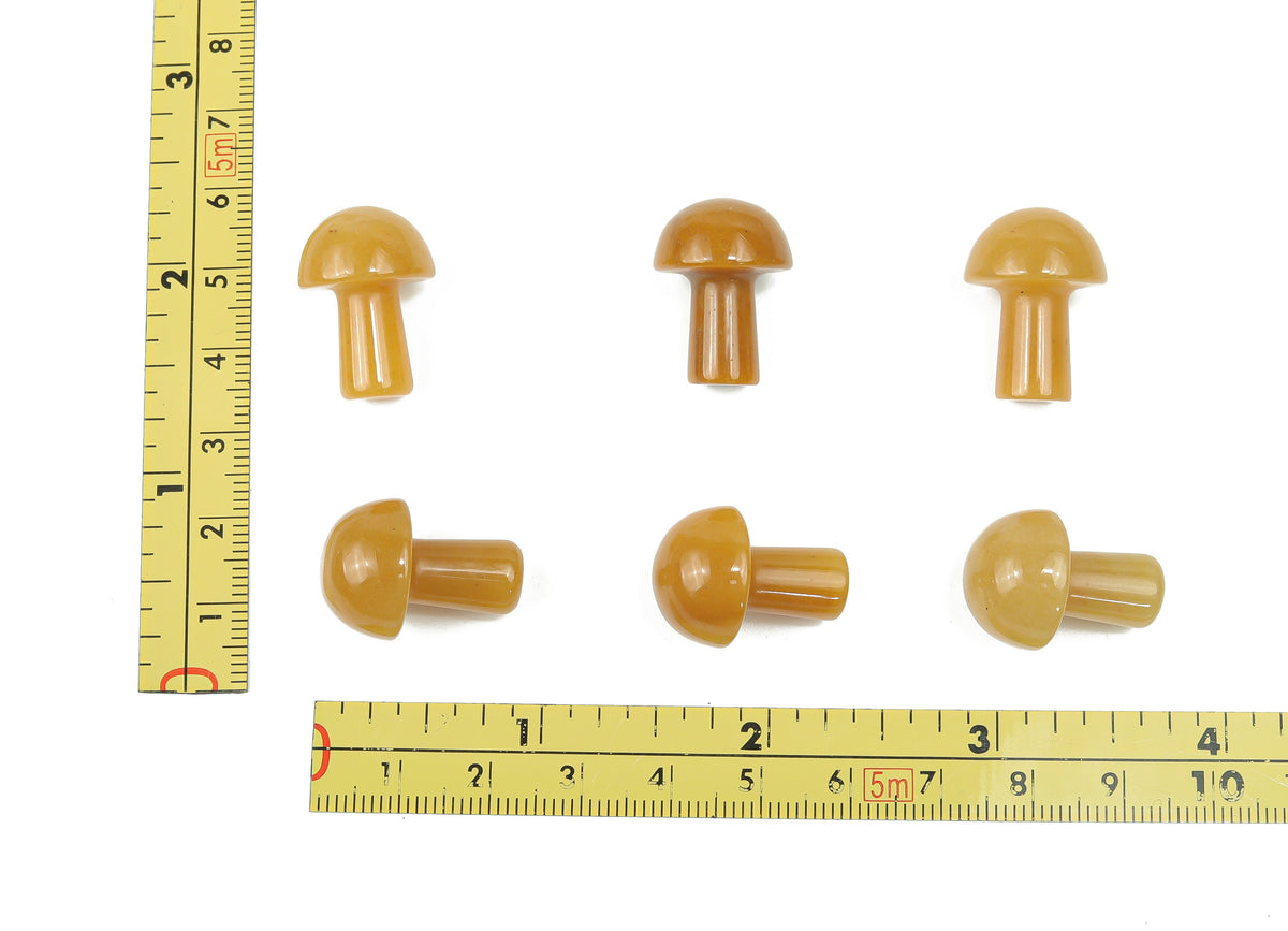 Yellow aventurine mushroom carved gemstone, 20mm, showing detailed natural stone carving and vibrant yellow color.