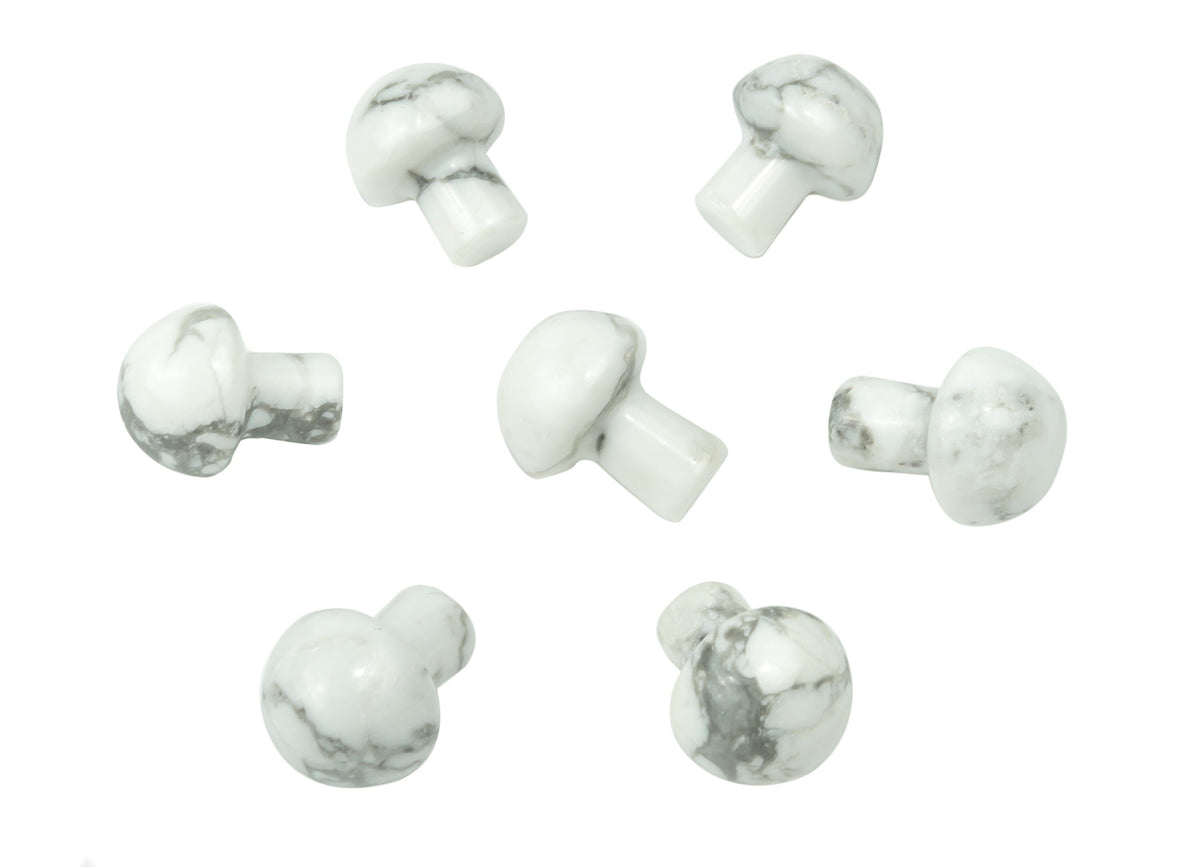 20mm Howlite mushroom carved gemstone from GemstoneGO, showcasing smooth white stone with natural veining and mushroom shape.