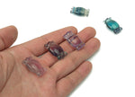 Bright green fluorite candy carving gemstone from GemstoneGO showcasing smooth, polished surface and vibrant coloration.