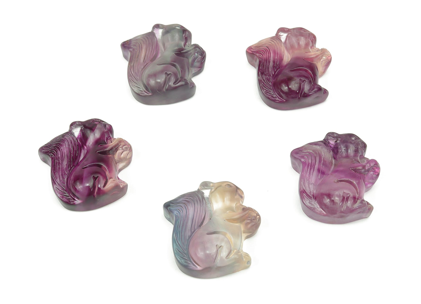 Colorful fluorite squirrel gemstone carving by GemstoneGO, detailed, polished mineral sculpture showcasing vibrant hues and intricate design.