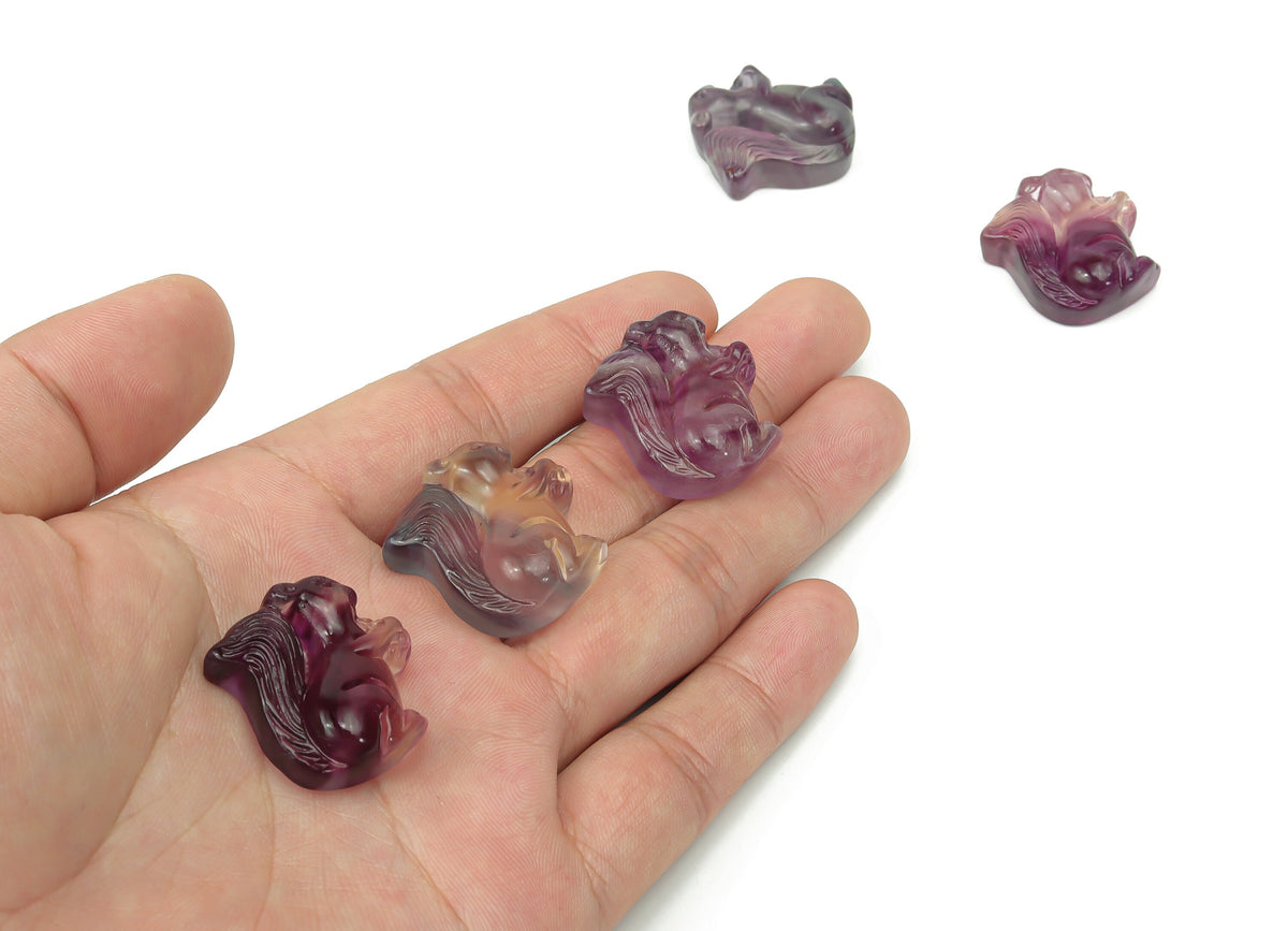 Fluorite squirrel gemstone carving from GemstoneGO, detailed purple and green mineral sculpture of a squirrel.