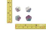 Mini Fluorite flower carving gemstone by GemstoneGO showcasing vibrant purple and green hues with intricate floral details.