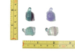 Small fluorite turtle gemstone carving by GemstoneGO, detailed multicolored mineral sculpture with natural stone textures.