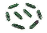 Ruby Zoisite terminated carved point gemstone from GemstoneGO, 33mm, featuring vibrant red and green mineral patterns.