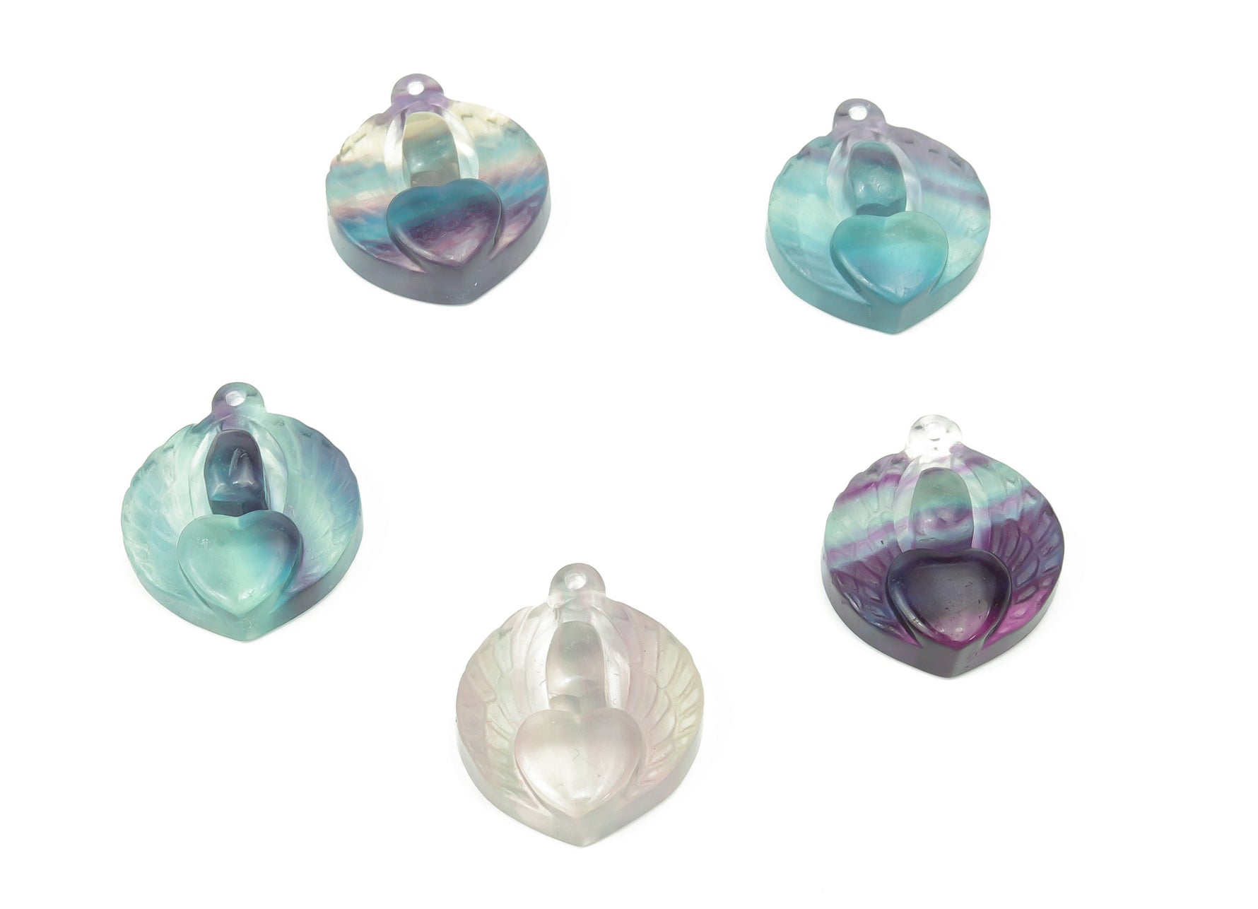 Pink and green fluorite heart-shaped crystal pendant with a hole for jewelry, created by GemstoneGO.