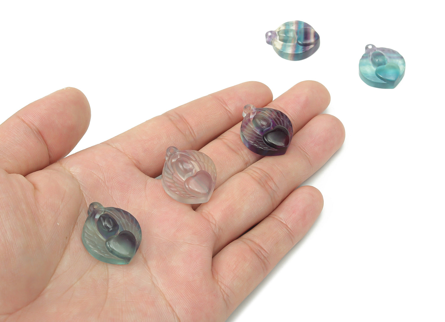 Pink and green fluorite heart-shaped crystal pendant with hole for necklace, from GemstoneGO.
