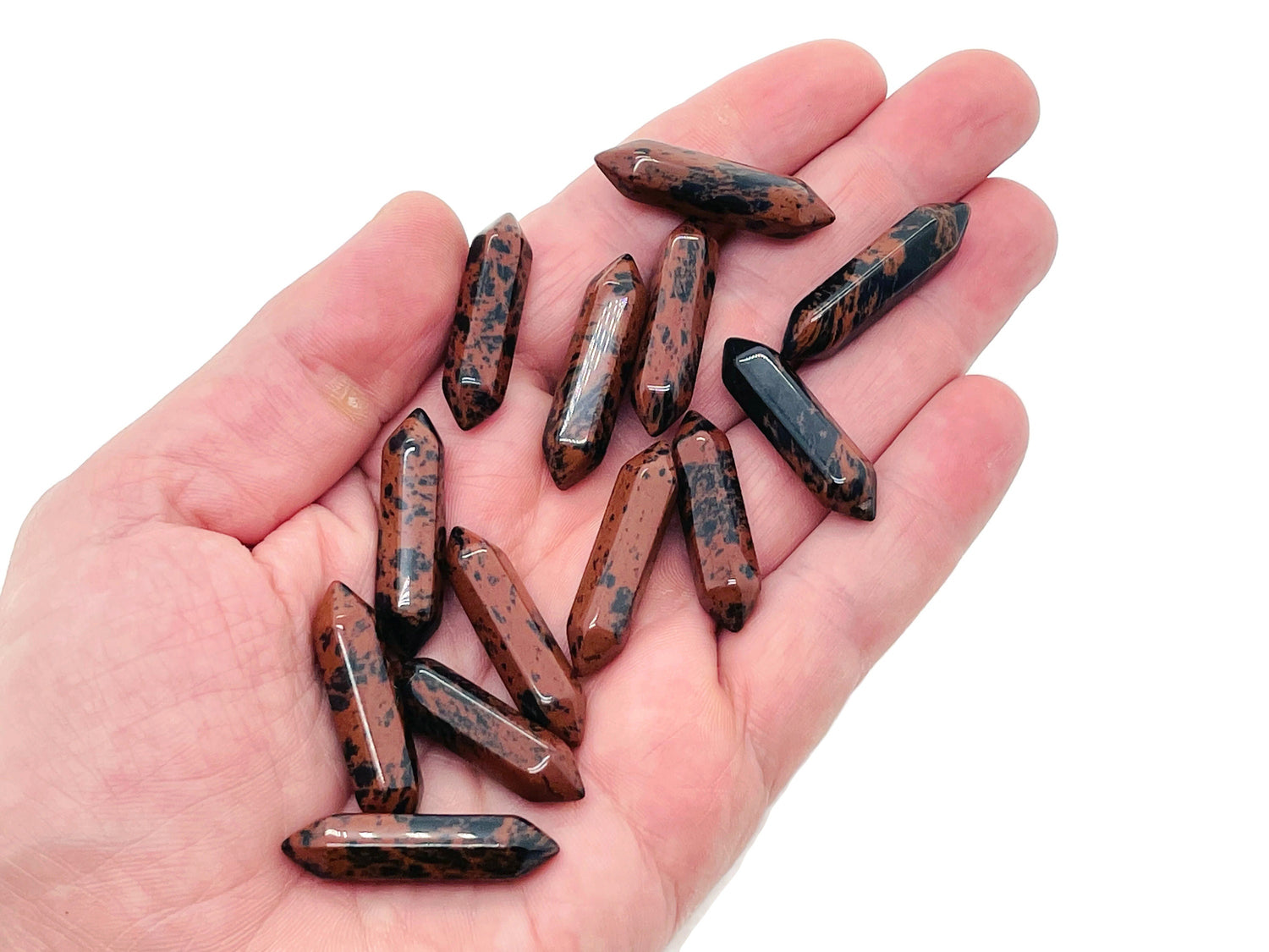 Mahogany Obsidian terminated carved crystal point, 33mm, from GemstoneGO with natural stone details and polished finish.