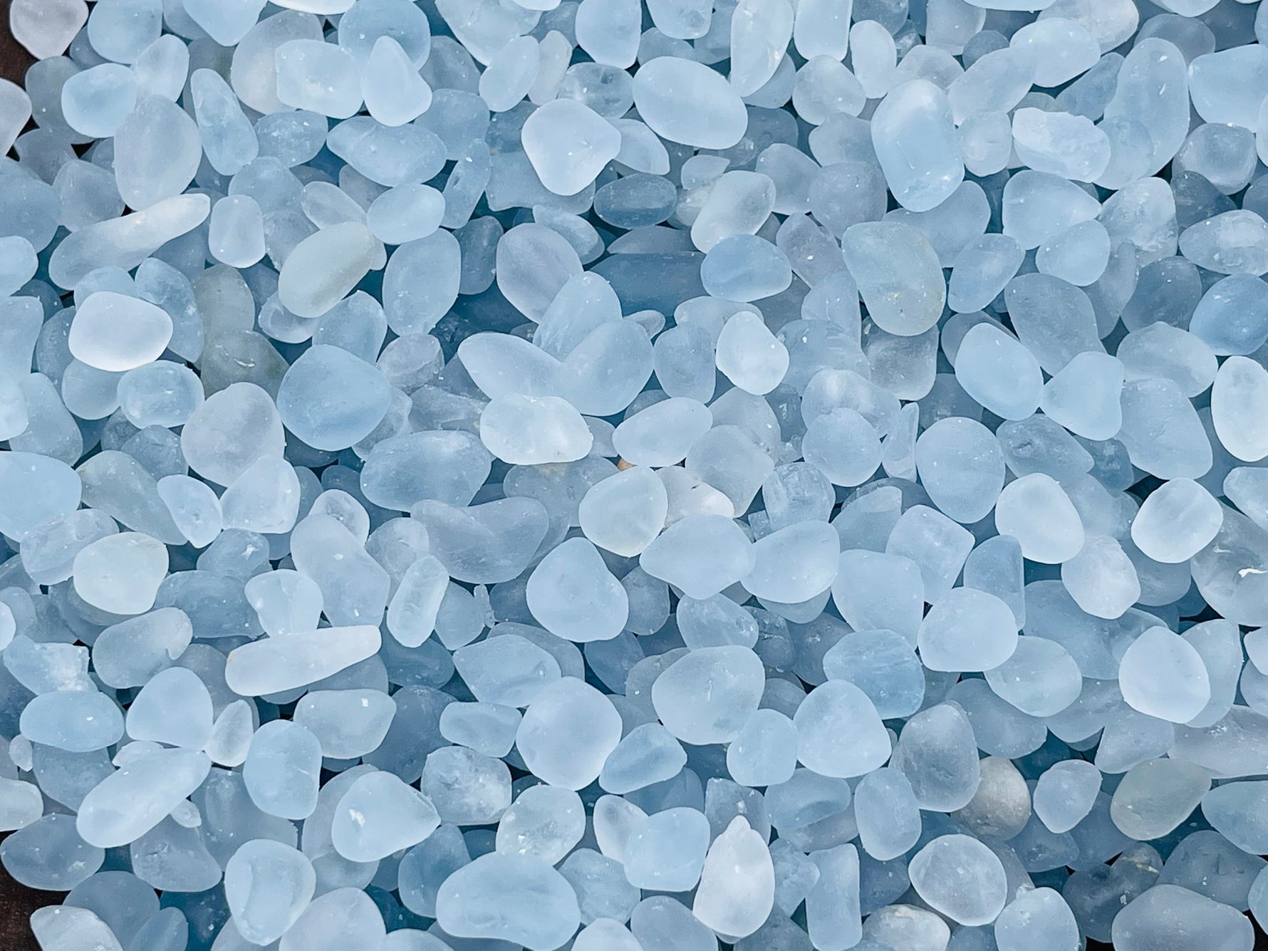 Semi-tumbled Celestite crystal chips in 5-10mm, natural blue gemstone stones, ideal for jewelry or crystal healing.