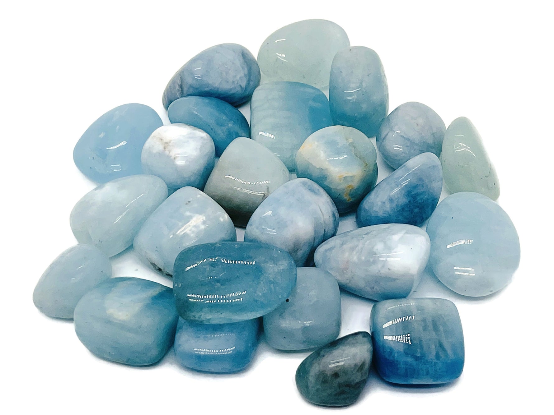 Aquamarine tumbled stone by GemstoneGO, smooth blue gemstone with polished surface, ideal for jewelry or healing practices.