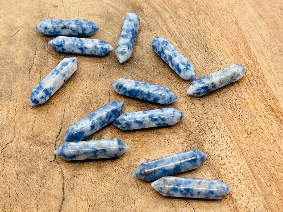Blue Spot Jasper carved pointed gemstone, 33mm, with natural mineral patterns and vibrant blue spots, from GemstoneGO.