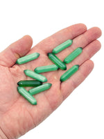 Green Cats Eye gemstone carved point, 33mm, from GemstoneGO, showing a smooth carved surface with vibrant green chatoyancy.