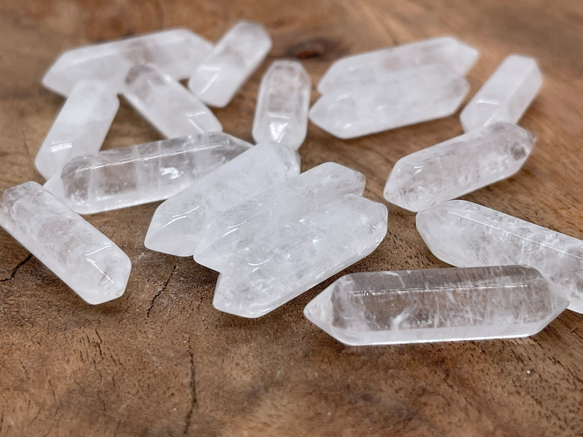 Transparent clear quartz terminated carved point, 33mm gemstone from GemstoneGO with a pointed, polished crystal appearance.
