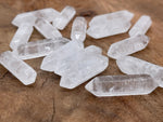Transparent clear quartz terminated carved point, 33mm gemstone from GemstoneGO with a pointed, polished crystal appearance.