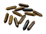 Tiger Eye terminated carved point gemstone, 33mm, from GemstoneGO, featuring a polished, natural stone with a pointed shape.