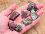 Raw Dragon Blood Jasper gemstone from GemstoneGO, showcasing deep red and black natural stone with unique patterns.