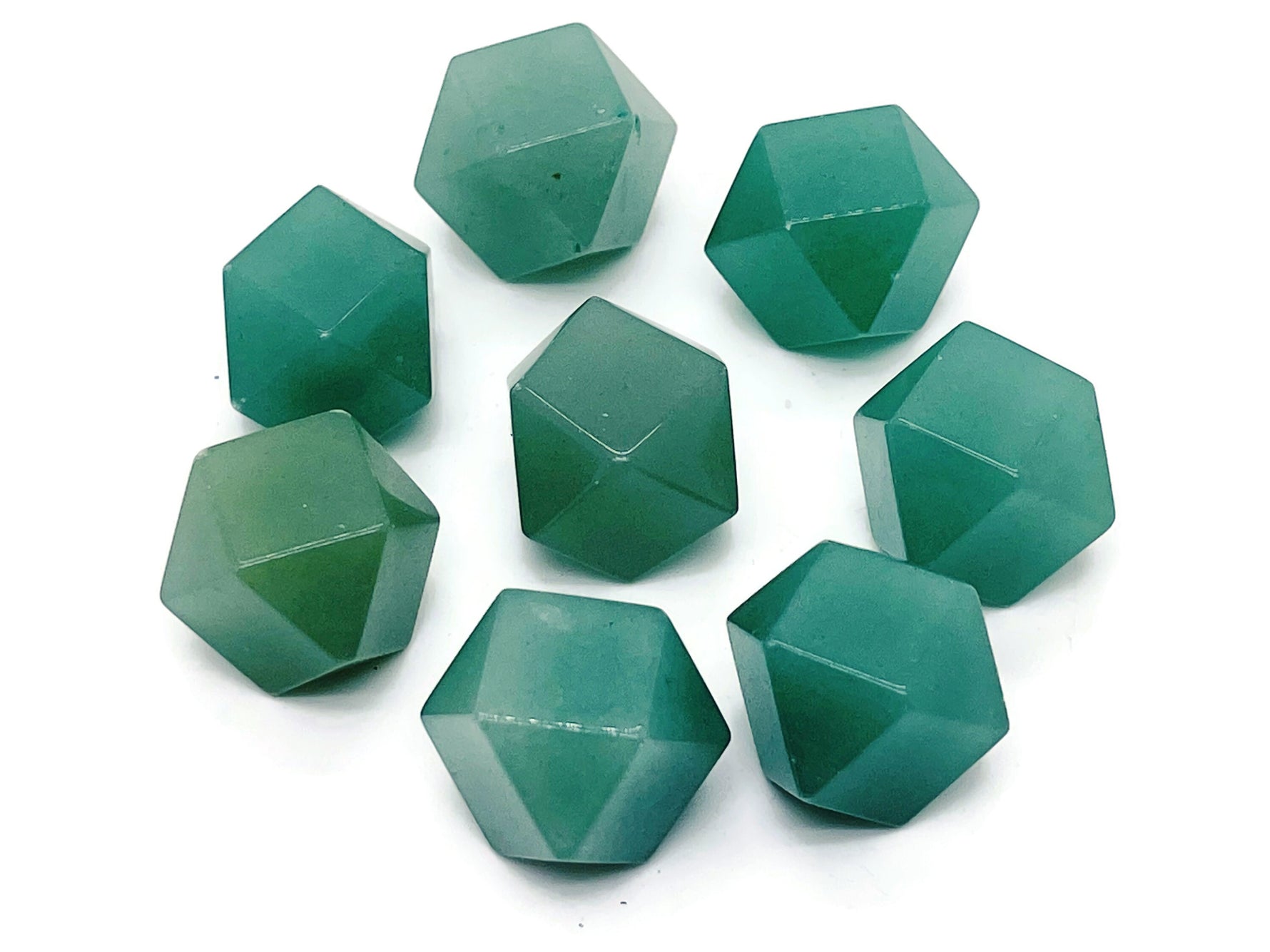 20mm Aventurine polyhedron carved gemstone from GemstoneGO showing its green, faceted surface and geometric shape.