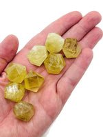 Citrine polyhedron carved gemstone, 20mm, from GemstoneGO, showing a bright orange-yellow faceted stone on a neutral background.