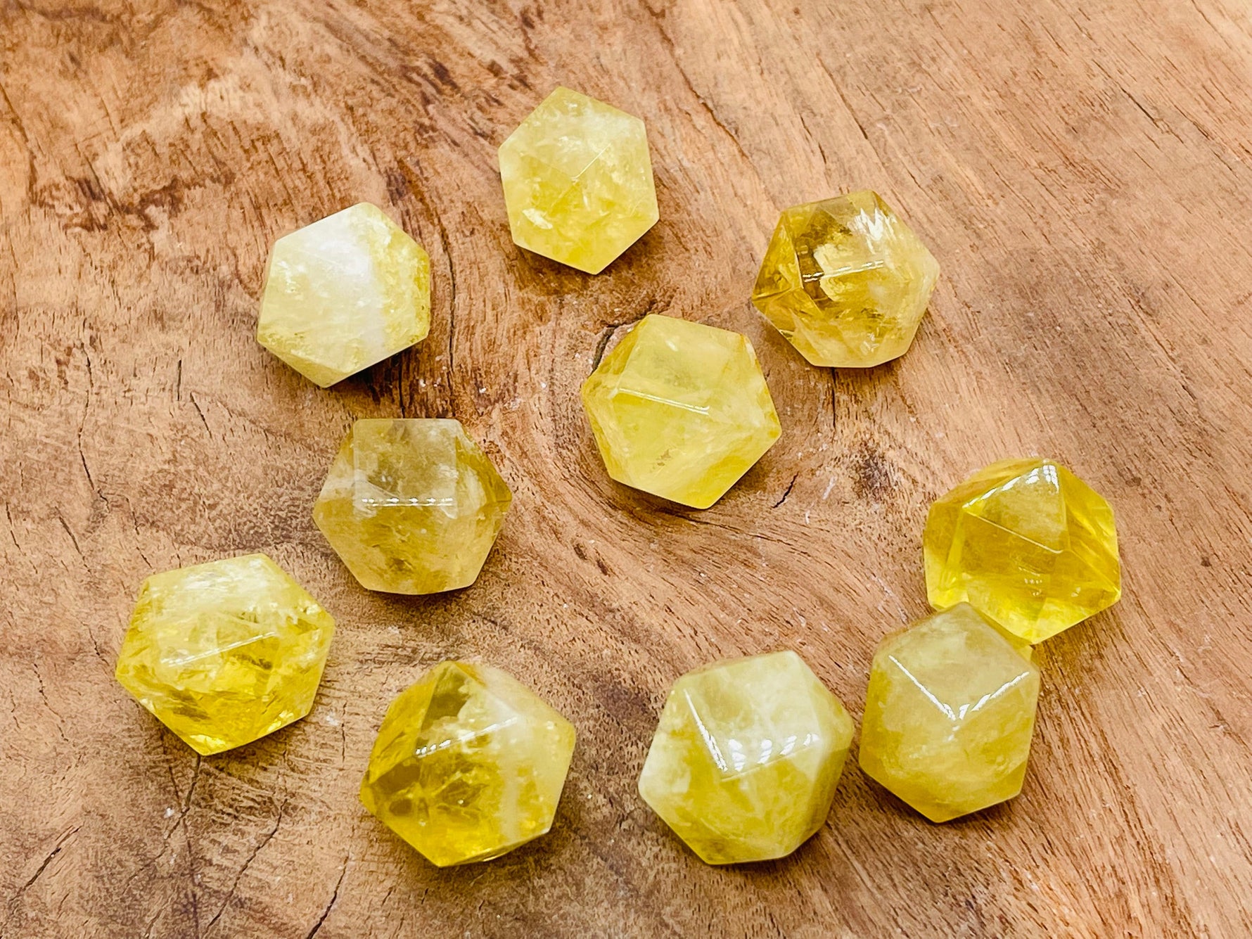 Citrine polyhedron carved gemstone, 20mm, from GemstoneGO, showcasing a vibrant yellow-orange, faceted stone with detailed carving.