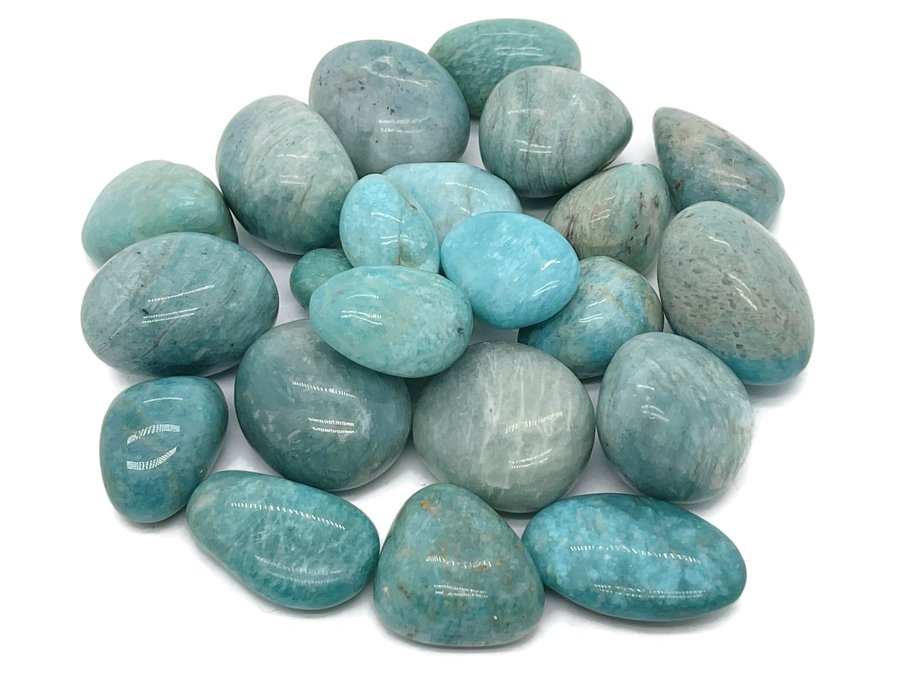 Polished Amazonite tumbled stone from GemstoneGO, smooth blue-green mineral with natural variations and subtle mineral inclusions.