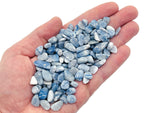 Blue Aventurine crystal chips, semi-tumbled 5-7mm gemstone from GemstoneGO, shown in a close-up of the bulk collection.