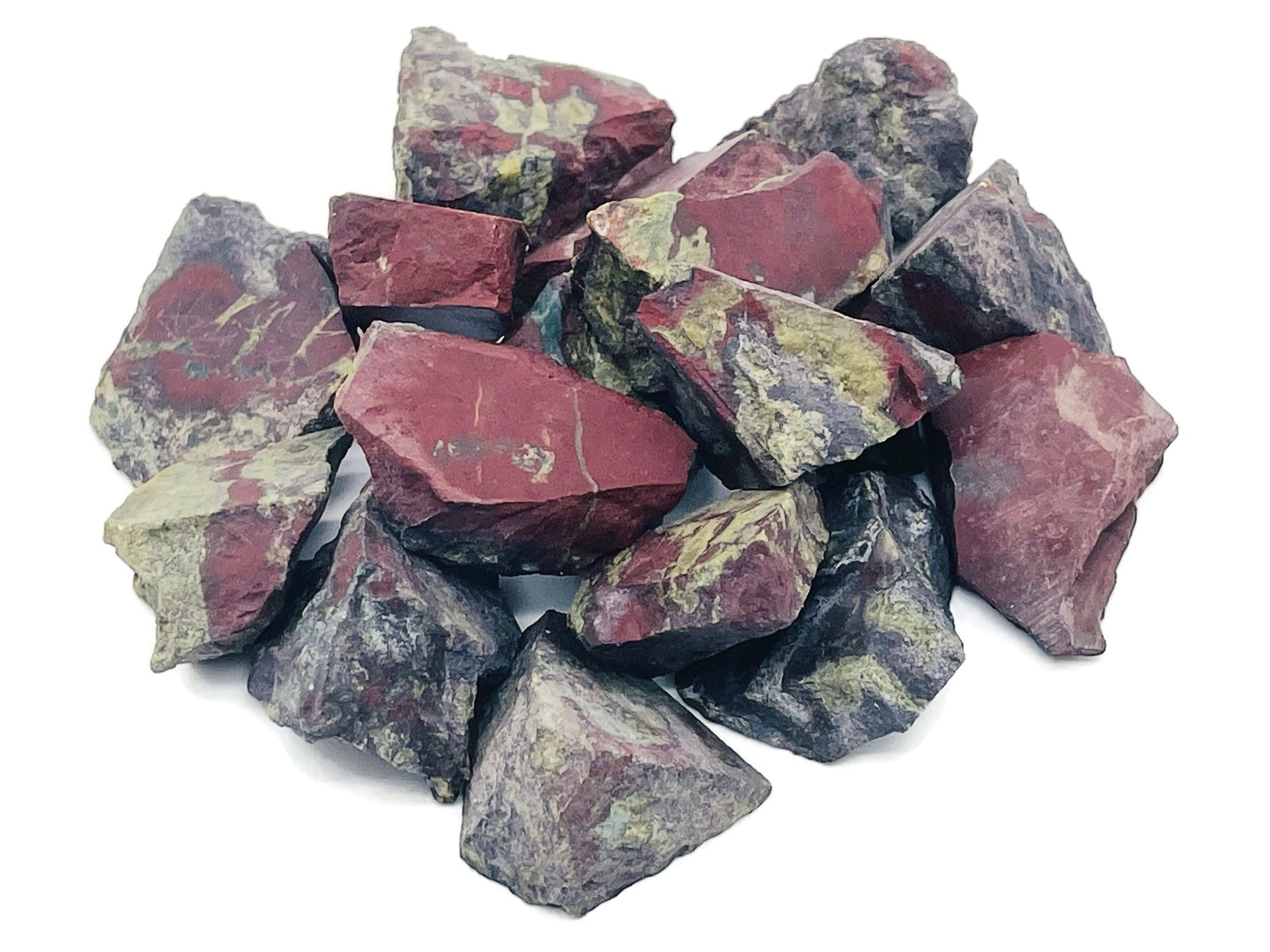 Raw Dragon Blood Jasper gemstone from GemstoneGO showing deep red and black mineral patterns in a natural unpolished form.