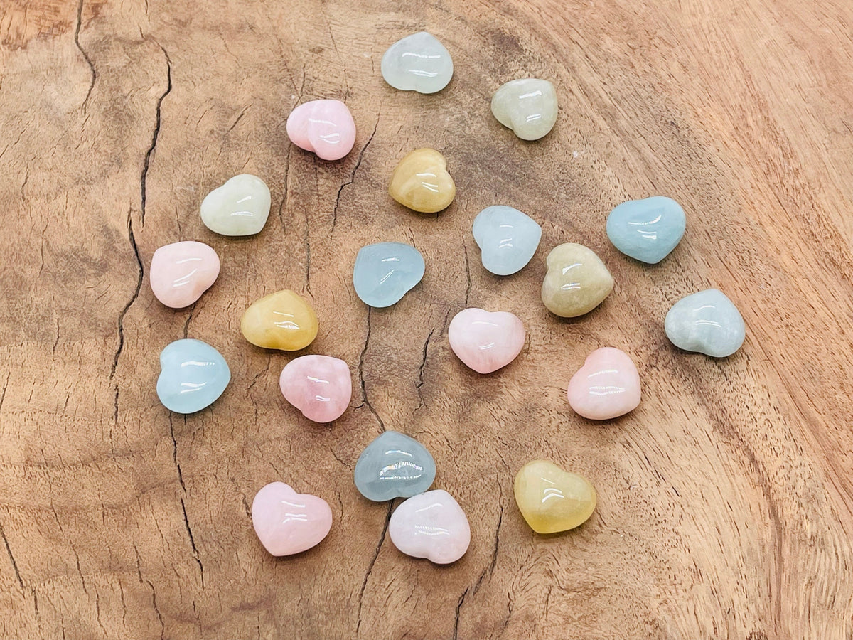 Aquamarine Morganite heart-shaped gemstone, 15x15x9mm, from GemstoneGO, showcasing a vibrant, faceted pink and blue gemstone.