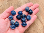 Mini Sodalite Saturn crystal carved gemstone, 18mm planetary pendant, featuring deep blue and white mineral patterns from GemstoneGO