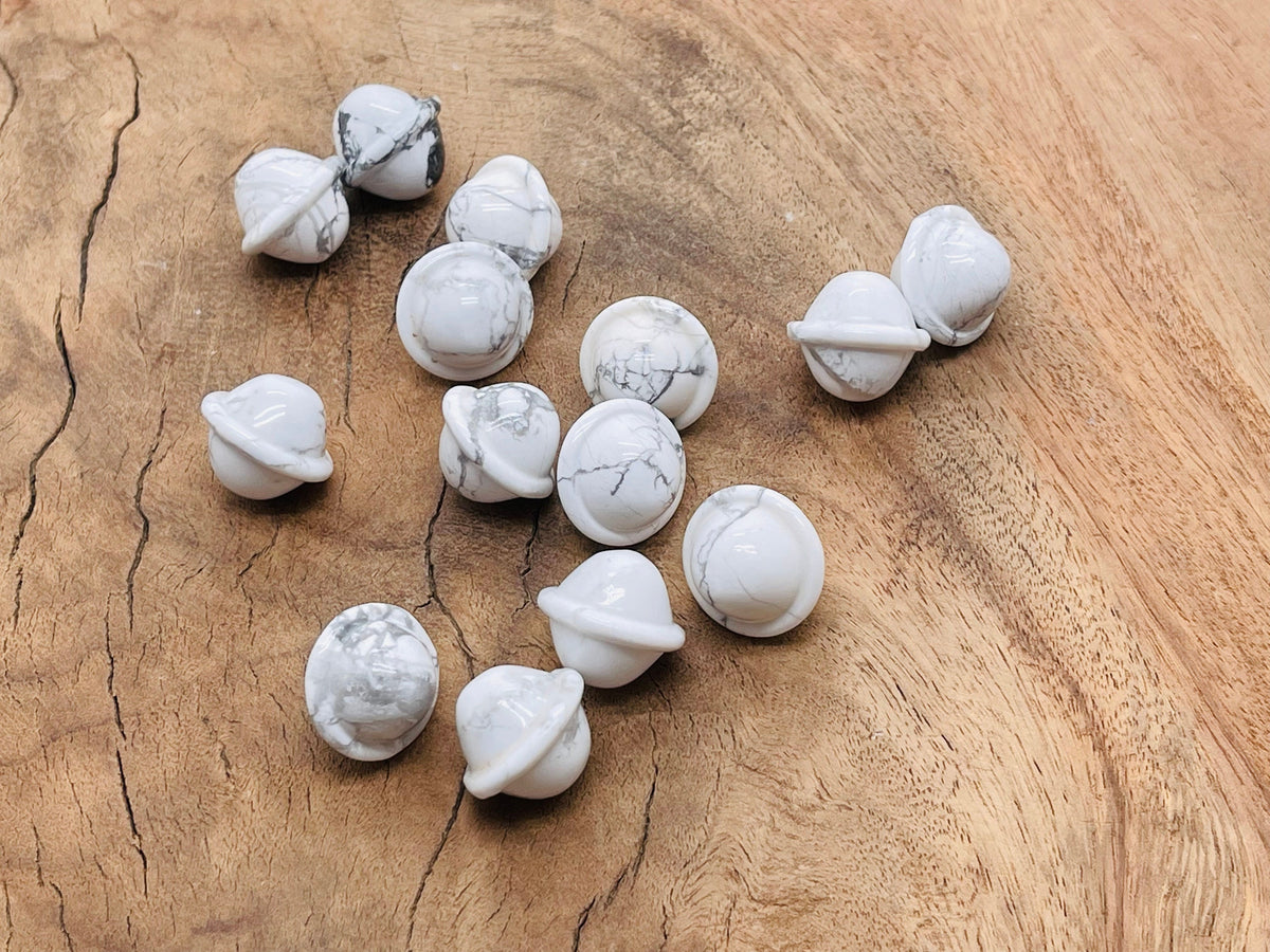 Mini 18mm Howlite Saturn crystal carved gemstone planet, showcasing detailed planetary design, from GemstoneGO.