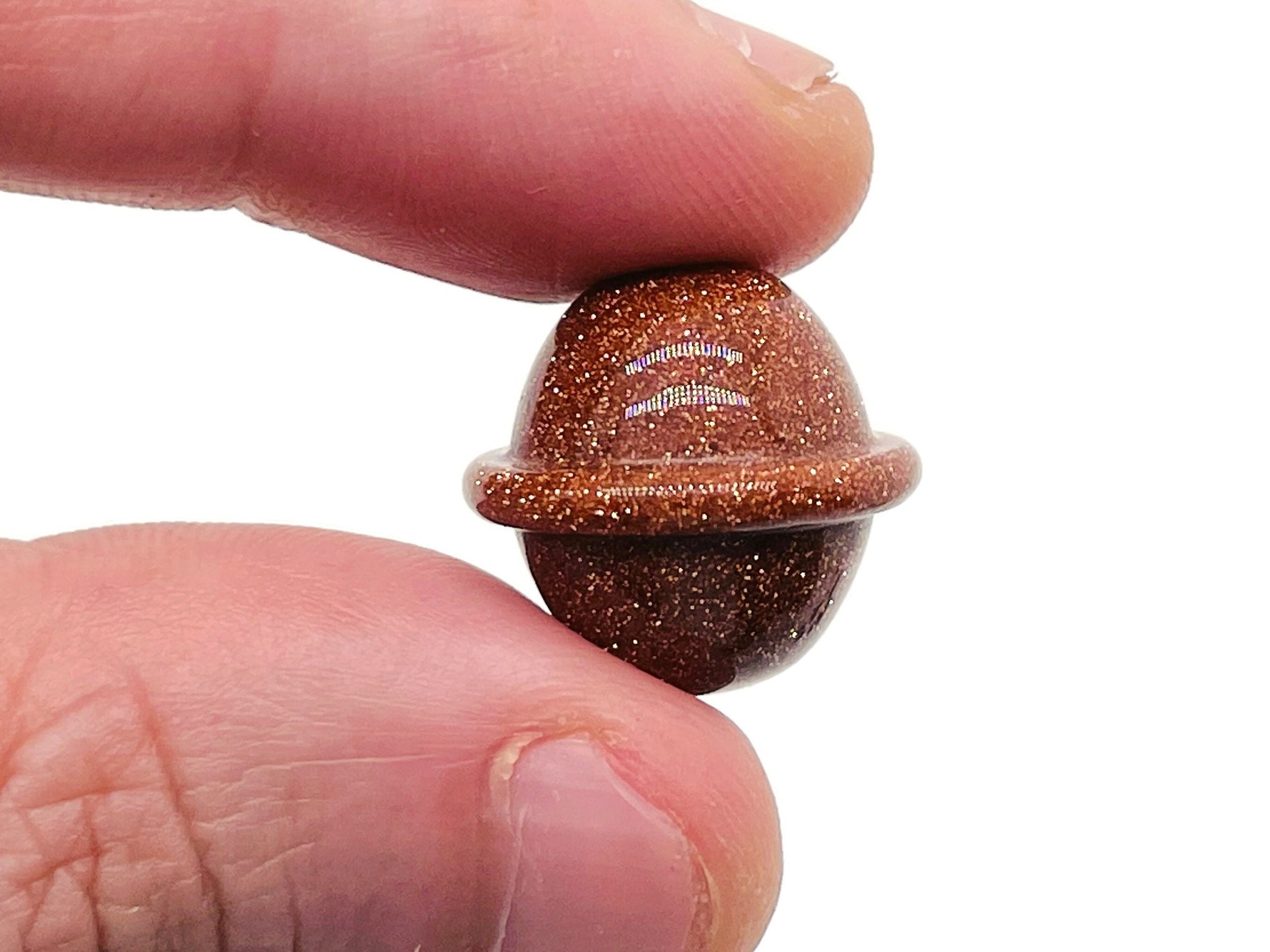 Goldstone Saturn-shaped carved gemstone mini planet, 18mm size, from GemstoneGO, showcasing detailed planetary design and rich golden color.